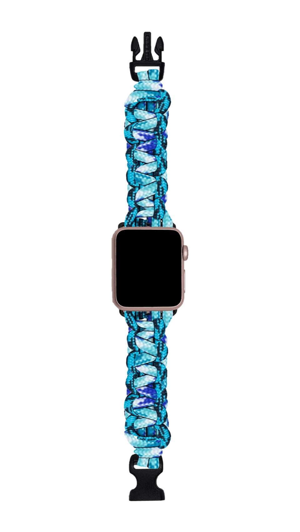 A smartwatch with a rectangular screen and a vibrant, woven durable watch band is displayed. The band, reminiscent of paracord watch bands, is made of intertwined blue, white, and black cords and features black buckles at both ends. This design ensures it's not only stylish but also smartwatch compatible. Introducing the Custom Paracord Watch Bands - Durable, Stylish, Made in USA by Insanely Paracord.