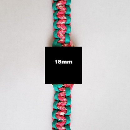 A close-up view of an Insanely Paracord Paracord Watch Band - Durable 2-Color Design for Apple, Fitbit, Samsung made from teal, pink, and white paracord. Perfect for outdoor enthusiasts, the watch band measures 18mm in width, as indicated by a black square with "18mm" in white text positioned at the center of the image.