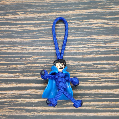 a blue key chain with a monkey on it