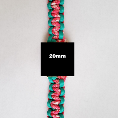 A colorful braided cord with interwoven pink, white, and green strands is shown against a plain white background. A black square in the center of the image has white text reading "20mm," indicating the width of this high-quality Insanely Paracord Paracord Watch Band for Smartwatches - Strong & Durable - Over 100 Colors & Patterns - Easy to Install & Clean - Fits Apple, Fitbit, Samsung, ideal for outdoor enthusiasts crafting paracord watch bands.